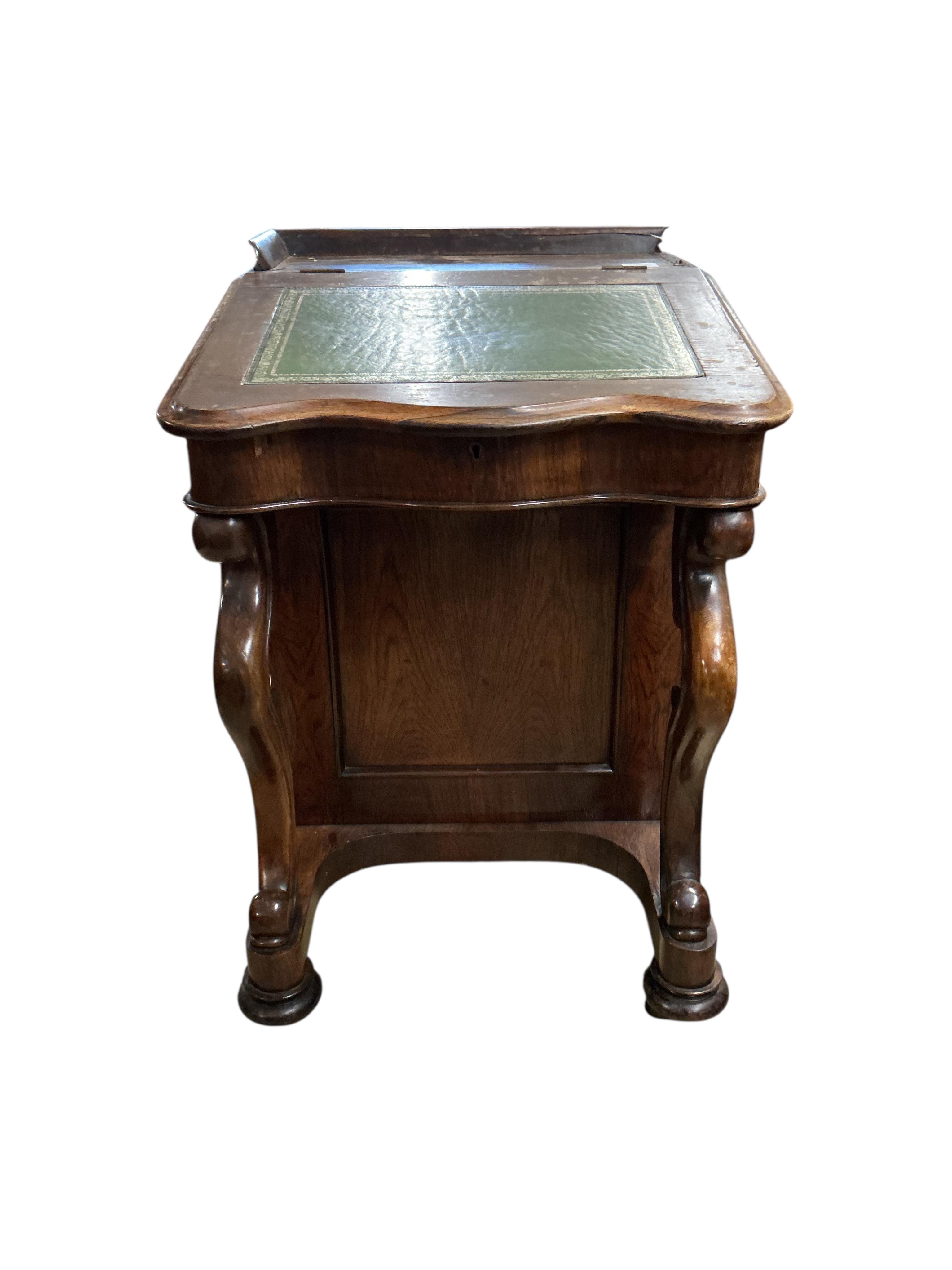 A Victorian rosewood davenport, width 54cm, depth 60cm, height 83cm